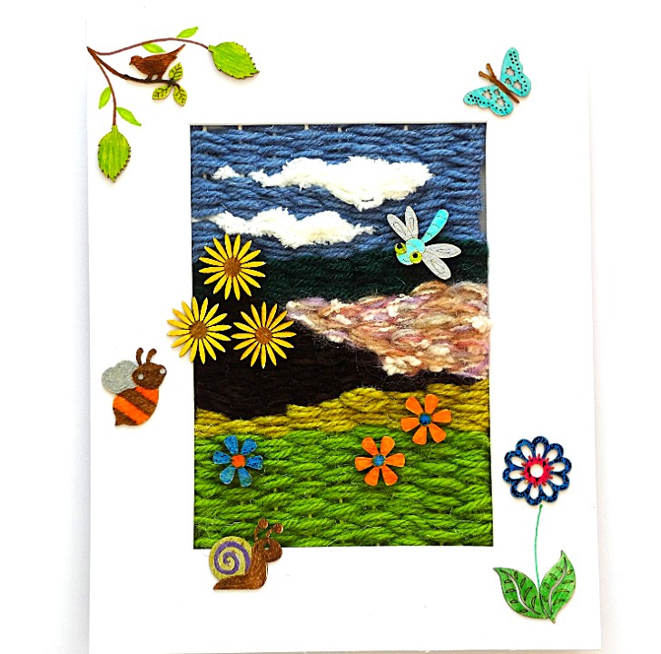 Woven garden picture craft project for kids weaving workshop at North Hertfordshire Museum.